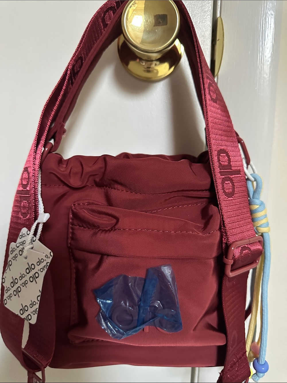 Alo..Everyday Crossbody Bucket Bag in Deep Wine
